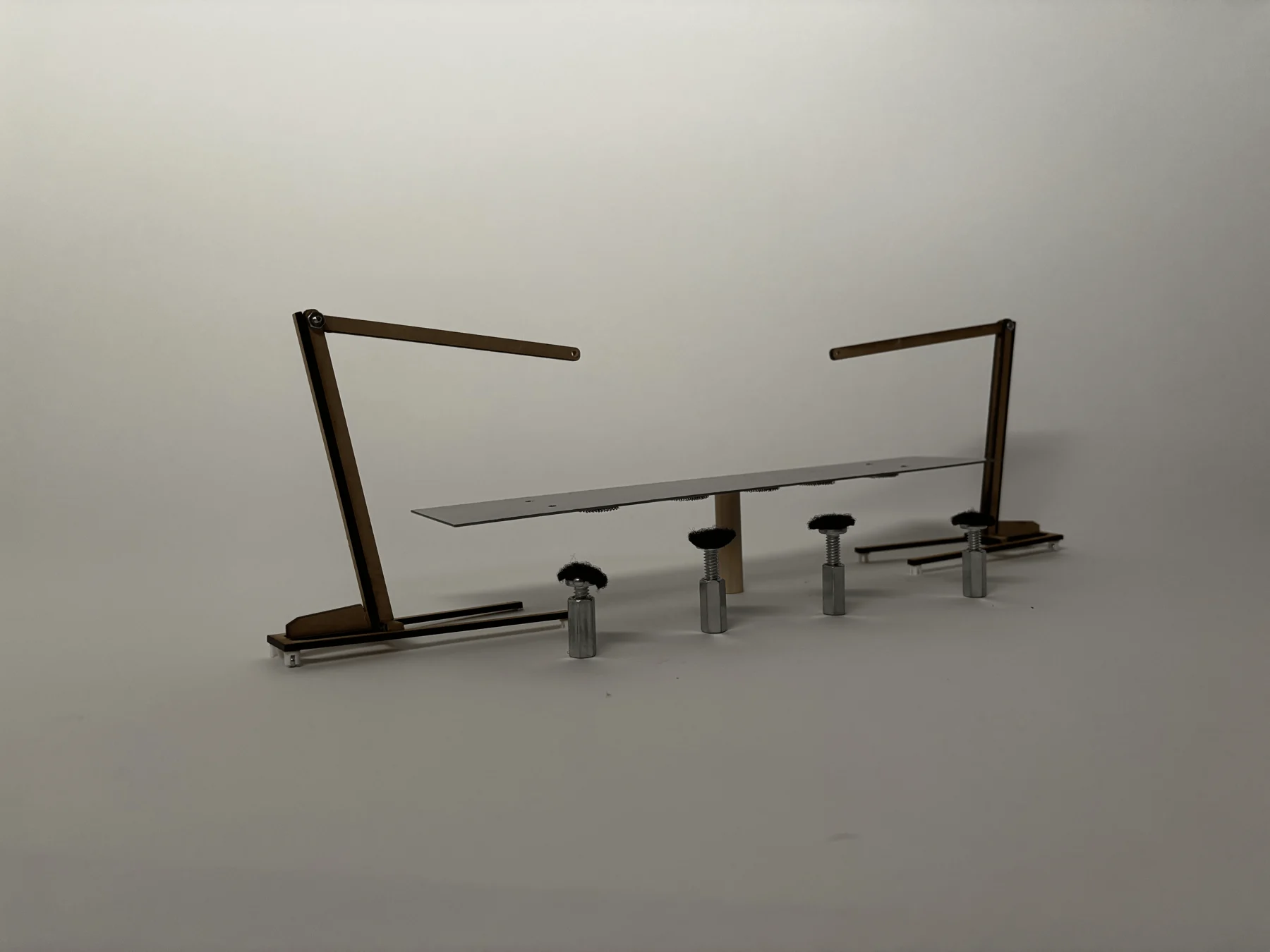 Architecture studio models and portfolio work arranged across a table